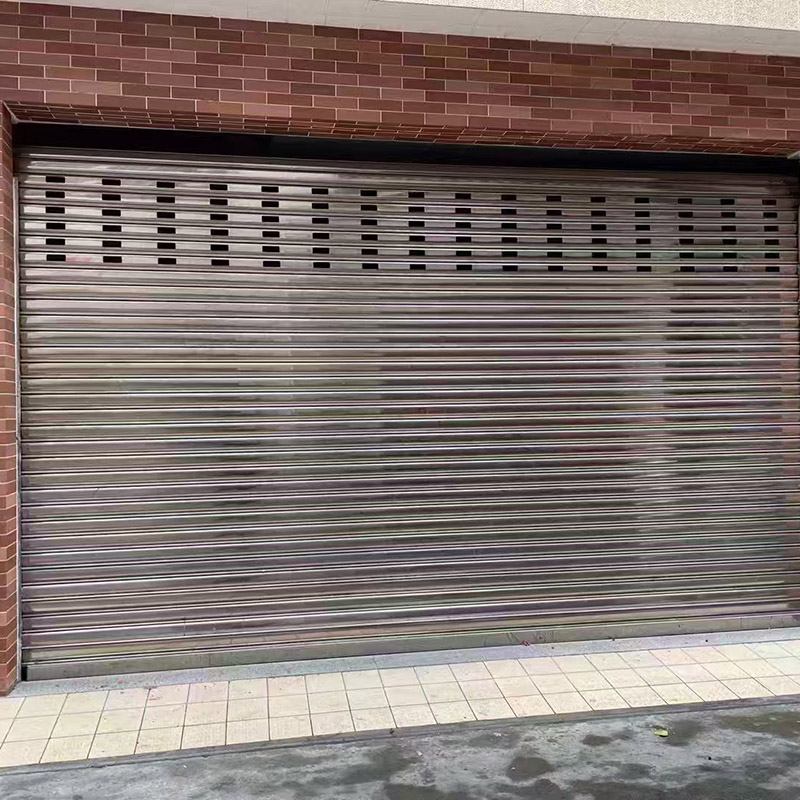 Roller shutter doors with alarm systems